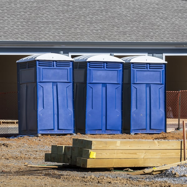 what is the cost difference between standard and deluxe portable toilet rentals in Boyceville